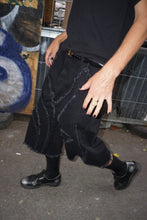 Load image into Gallery viewer, Jarrad is 5’ 9” wearing size M in Saloon Jean shorts Black
